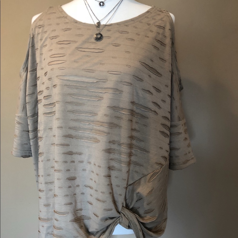 Cold shoulder distressed top